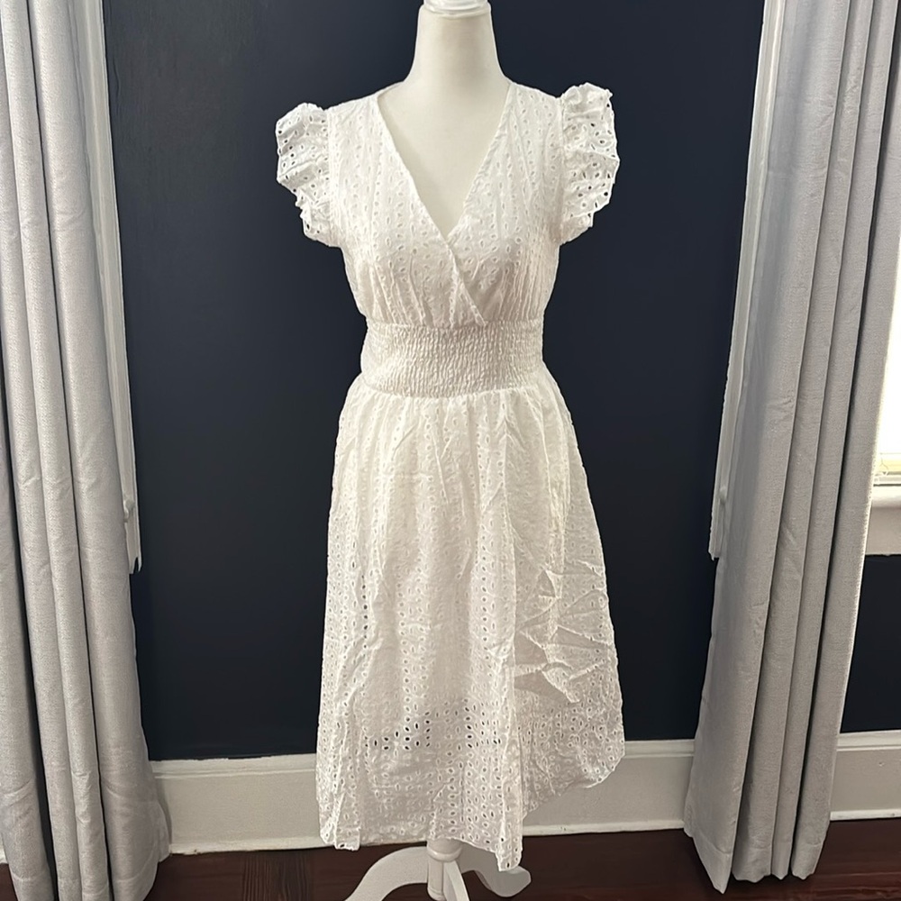 Gorgeous NWOT eyelet Summer/Spring dress. Never worn in a smoke free house